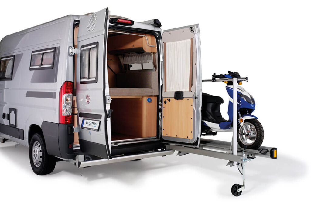 The Agito 1 van motorcycle carrier pivots easily thanks to its jockey wheel, even when loaded with a scooter.