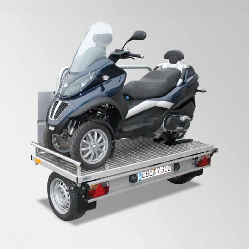 MP3 scooter loaded onto a Wheely cross trailer